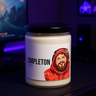 CaseOh Simpleton candle on a gaming desk in a purple-lit room, 12 oz paraffin candle in a glass jar with a black lid